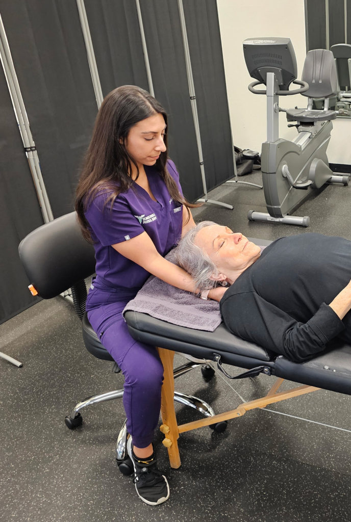 Jessica Prince giving a woman a massage